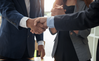 Business people shaking hands