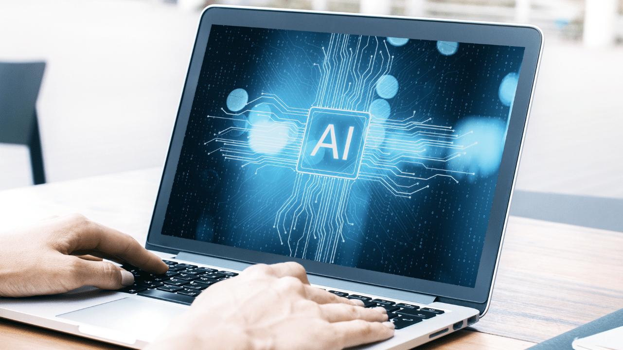 Laptop with image of "AI" in the center of the screen